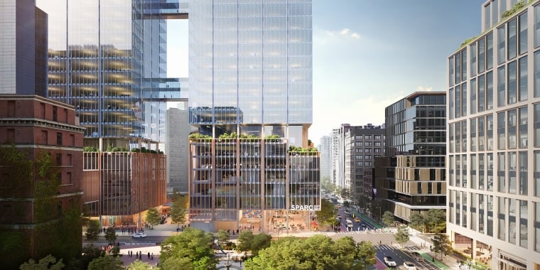 Aerial rendering of SPARC Kips Bay. A modern cityscape with tall glass skyscrapers reflecting sunlight. The buildings are surrounded by trees and busy streets filled with cars and people. Balconies with greenery are visible. The word SPARC is on one of the buildings.